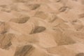 Focus of golden wavy sand in desert