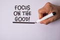 Focus on the good. Inspirational Message Written with Marker on White Background Royalty Free Stock Photo