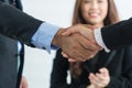 Focus hand handshake of two businessmen