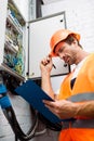 Focus of handsome electrician in hardhat Royalty Free Stock Photo