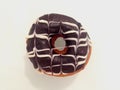 Focus image selectively on donut bread on color background.