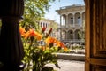 focus on a jardinier in front of georgian architecture Royalty Free Stock Photo