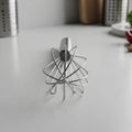 Focus is primarily on the whisk emphasizing its sleek and functional Royalty Free Stock Photo