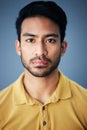 Focus, serious and portrait of a male in studio with moody, sadness or mental health problem. Tired, concentrating and