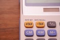 Focus the tax button on the calculator. Concept of calculation and annual tax refund Royalty Free Stock Photo