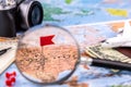 Focus United states with pin and magnifying glass on world map background