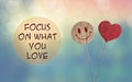 Focus on what you love with heart and smile emoji Royalty Free Stock Photo
