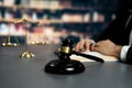 Focus wooden gavel hammer on blur background. Equilibrium