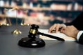 Focus wooden gavel hammer on blur background. Equilibrium