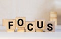Focus Word Written In Wooden Cube, concept