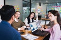 Focus on young beautiful asian woman having question in group brainstorm meeting in office.Businesspeople discussing with Royalty Free Stock Photo