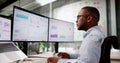 Focused African American Man Analyzing KPI Data Royalty Free Stock Photo