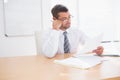 Focused businessman reading document Royalty Free Stock Photo
