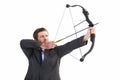 Focused businessman shooting a bow and arrow Royalty Free Stock Photo