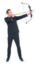 Focused businessman shooting a bow and arrow