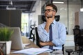 Focused businessman thinking at modern office into report file calculating stock market earnings, startup business Royalty Free Stock Photo