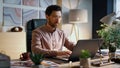 Focused businessman working laptop in office close up. Worker surfing internet. Royalty Free Stock Photo