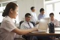 Focused Businesswoman working on her laptop in the office Royalty Free Stock Photo