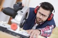 Focused carpenter at work Royalty Free Stock Photo