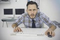 Focused casual businessman working at his desk Royalty Free Stock Photo