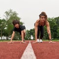 Strong mother and son wait on start before run