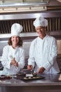 Focused chef preparing a cake Royalty Free Stock Photo