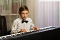 Focused Child at Piano Recital Royalty Free Stock Photo