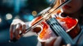 Focused child playing violin at night, illuminated by warm light, capturing concentration, music education, and artistic Royalty Free Stock Photo
