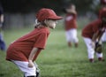 Focused child ready to play ball