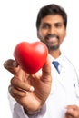 Focused close-up of heart shape held by medic Royalty Free Stock Photo