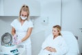 Focused doctor getting ready for a platelet-rich plasma injection Royalty Free Stock Photo