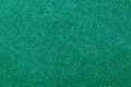 Focused emerald texture glitter background