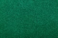 Focused emerald texture glitter background