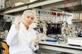 Focused female technician working in research laboratory Royalty Free Stock Photo