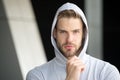 Focused future achievement. Guy bearded attractive casual clothes hooded. Man with bristle concentrated face urban