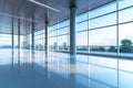 Focused on glass doors: Abstract backdrop shows empty office lobby through curtain wall.