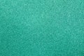 Focused green texture glitter background