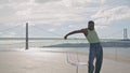 Focused man dancing ocean view closeup. African american dancer moving body Royalty Free Stock Photo