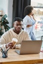 focused handsome man looking at laptop