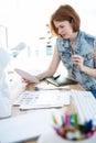 focused hipster business woman working at her desk Royalty Free Stock Photo