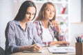 Focused ladies working on project Royalty Free Stock Photo