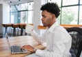 Focused male office worker with laptop and coffee Royalty Free Stock Photo