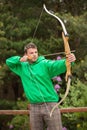 Focused man practicing archery Royalty Free Stock Photo