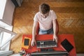 Focused man works remotely at home on a computer. Concept of self-isolation during an outbreak of a viral epidemic and