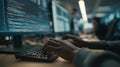 Focused medium shot capturing a coders hands typing framebyframe SKU hotspot embeddings while the surrounding Royalty Free Stock Photo