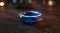 Focused medium shot of a futuristic beamforming speaker ring on a wooden surface showcasing dynamic light patterns Royalty Free Stock Photo