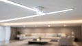 Focused motion sensor and LED ceiling panel in a stylish lounge ceiling highlighting energy control technology with the Royalty Free Stock Photo