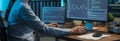 Focused Professional Working on Data Analysis and Programming with Multiple Screens Royalty Free Stock Photo
