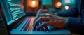 Focused programmer codes intensely on laptop. Hands type on keyboard lines of code illuminate screen. Creative tech developer