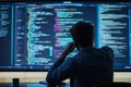 Focused programmer sits in front of a large screen filled with colorful code snippets, reviewing and analyzing details